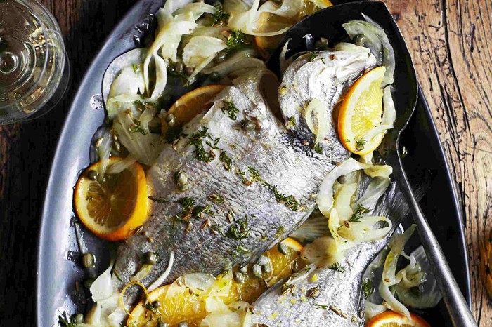 Roast fennel-stuffed bream with fennel seed and orange oil