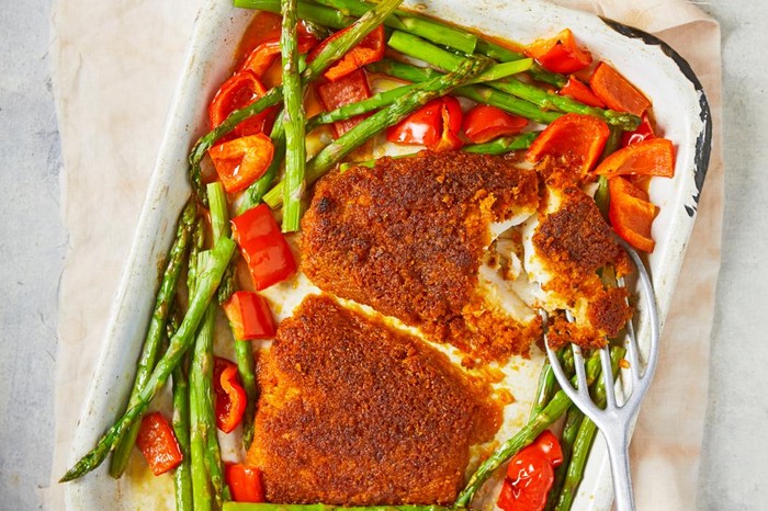 Roasted haddock with chorizo crust, asparagus and peppers
