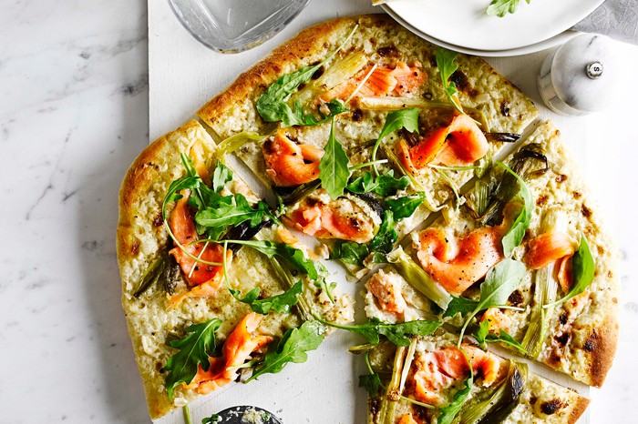 Pizza bianca with smoked salmon and spring onions