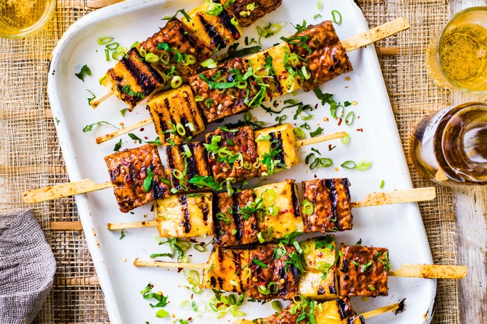 Pineapple Kebabs with Tempeh on a White Plate